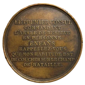 Inscription en neuf lignes horizontales.