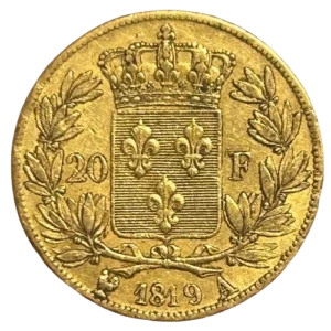 Tête de Louis XVIII à droite.