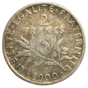 2 francs au dessus d'une branche d'olivier.