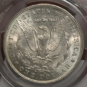 Aigle aux ailes déployées tenant une branche d’olivier et des flèches entres ses serres.