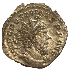 Buste radié, drapé et cuirassé de Postume à droite.