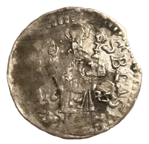 Le Christ debout de face nimbé et bénissant, derrière lui un champs d'étoiles.