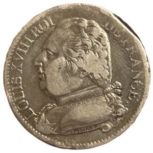 Buste Habillé de Louis XVIII à gauche.