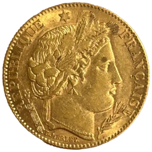 Tête de Cérès à droite coiffée d'une couronne de chêne et d'épis de blé.