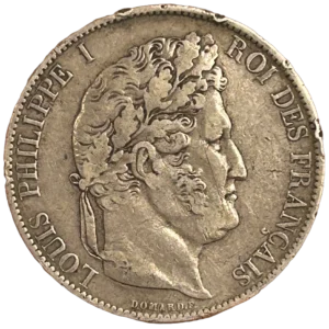 Tête laurée de Philippe Ier à droite.
