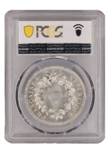 L'inscription "5 francs 1873" entouré d'une couronne de laurier et de chêne.