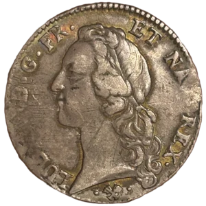 Tête laurée de Louis XV à gauche.
