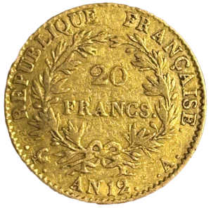 L'inscription 20 FRANCS dans une couronne formée de deux branches de laurier.