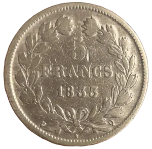 L'inscription "5 francs" entourée d'une couronne de laurier.