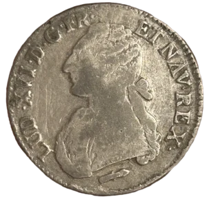 Tête laurée de Louis XVI à gauche.