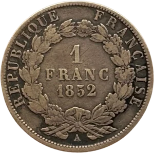 L'inscription "1 franc 1852" dans une couronne végétale.