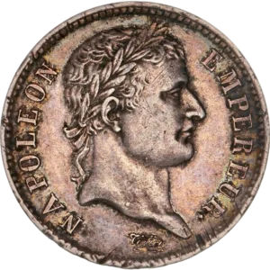 Tête laurée de Napoléon Ier à droite.
