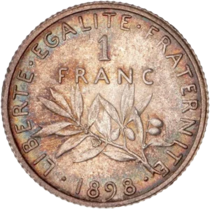 1 FRANC au-dessus d'une branche d’olivier.