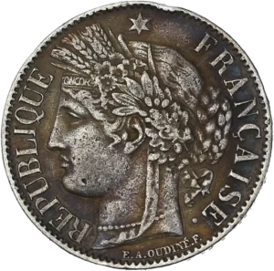 Tête de Cérès surmontée d'une couronne faite d'un ruban, de fleurs, d'épis de blé, de feuilles de laurier et de chêne. Un collier de perle entoure son cou.