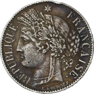 Tête de Cérès surmontée d'une couronne faite d'un ruban, de fleurs, d'épis de blé, de feuilles de laurier et de chêne. Un collier de perle entoure son cou.