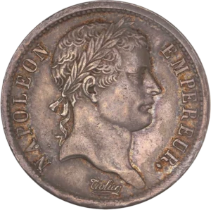 Tête laurée de Napoléon Ier à droite.