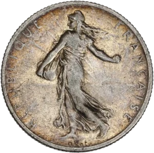 2 francs au dessus d'une branche d'olivier.