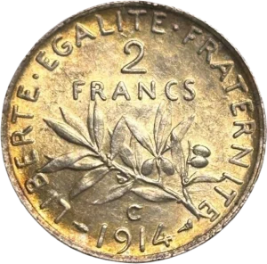 2 francs au dessus d'une branche d'olivier.