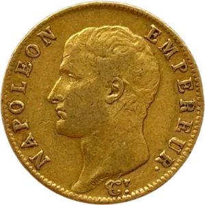 Tête nue de Napoléon Ier à gauche.