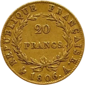 L'inscription 20 FRANCS dans une couronne formée de deux branches de laurier.