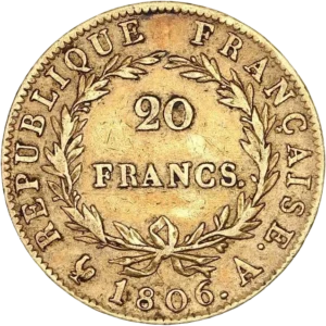 L'inscription 20 FRANCS dans une couronne formée de deux branches de laurier.