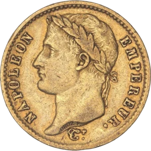 Tête laurée de Napoléon Ier à gauche.