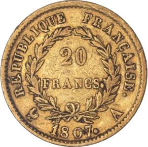 L'inscription 20 FRANCS dans une couronne formée de deux branches de laurier.