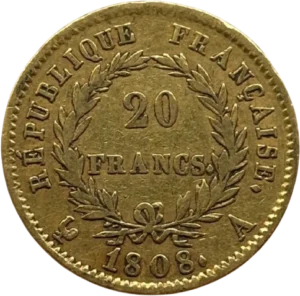 L'inscription 20 FRANCS dans une couronne formée de deux branches de laurier.