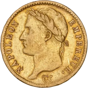 Tête laurée de Napoléon Ier à gauche.