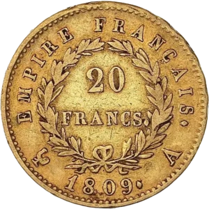 L'inscription 20 FRANCS dans une couronne formée de deux branches de laurier.