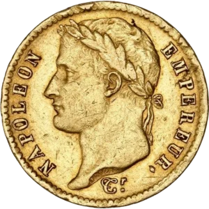 Tête laurée de Napoléon Ier à gauche.