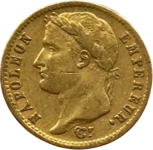 Tête laurée de Napoléon Ier à gauche.