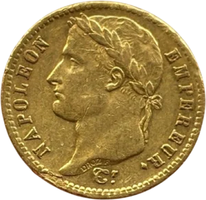 Tête laurée de Napoléon Ier à gauche.