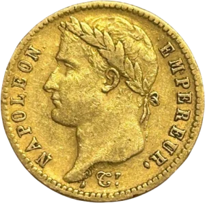 Tête laurée de Napoléon Ier à gauche.