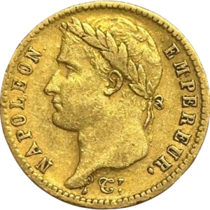 Tête laurée de Napoléon Ier à gauche.