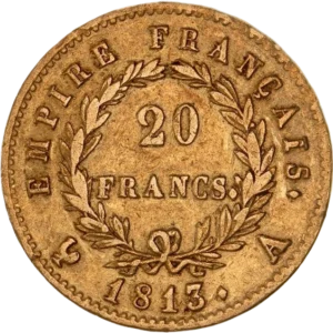 L'inscription 20 FRANCS dans une couronne formée de deux branches de laurier.