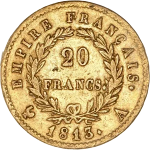 L'inscription 20 FRANCS dans une couronne formée de deux branches de laurier.