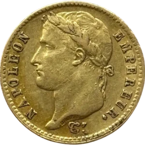 Tête laurée de Napoléon Ier à gauche.