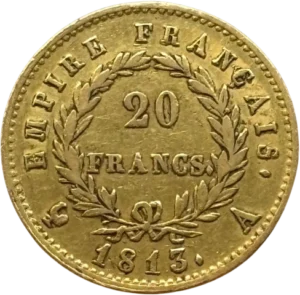 L'inscription 20 FRANCS dans une couronne formée de deux branches de laurier.