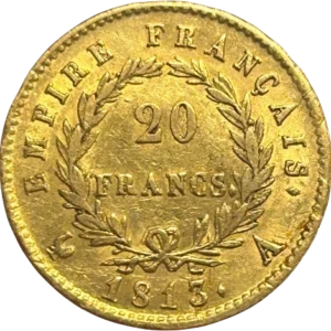 Tête laurée de Napoléon Ier à gauche.