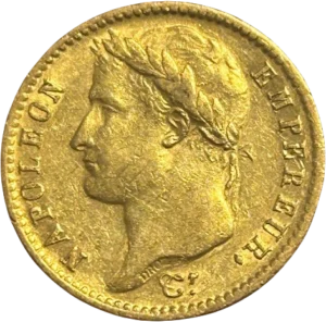 L'inscription 20 FRANCS dans une couronne formée de deux branches de laurier.