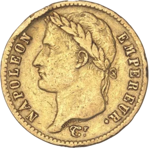 Tête laurée de Napoléon Ier à gauche.