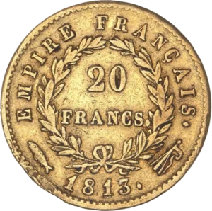 L'inscription 20 FRANCS dans une couronne formée de deux branches de laurier.