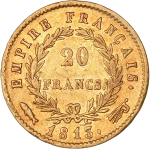 L'inscription 20 FRANCS dans une couronne formée de deux branches de laurier.