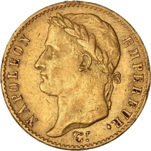 Tête laurée de Napoléon Ier à gauche.