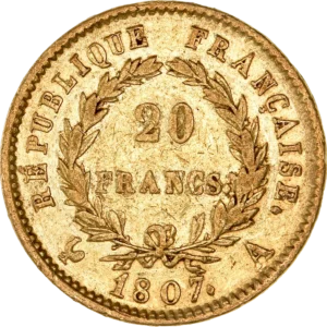 L'inscription 20 FRANCS dans une couronne formée de deux branches de laurier.