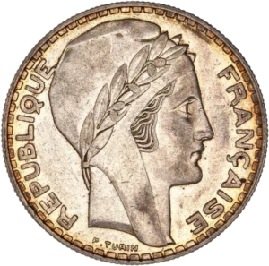 Tête laurée de Marianne à droite.