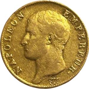 Tête nue de Napoléon Ier à gauche.