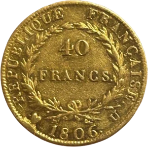 L'inscription 20 FRANCS dans une couronne formée de deux branches de laurier.