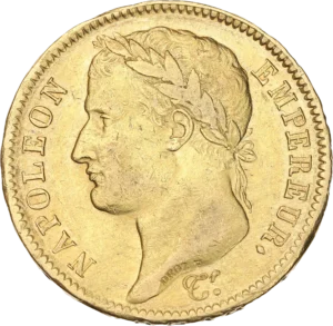 Tête laurée de Napoléon Ier à gauche.